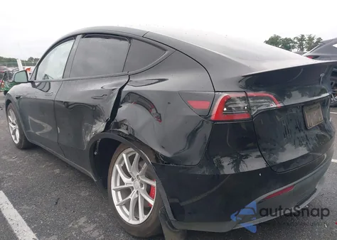 2023 Tesla Model Y Performance Dual Motor All-Wheel Drive z USA, uszkodzony, nr VIN 7SAYGDEF7PF980571